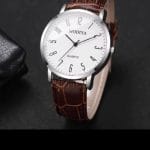 Screenshot_20251218_145725_AliExpress Basic Easy To Read Watch With Clear Numbers White Dial Black Strap