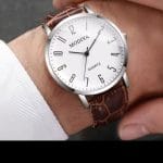 Screenshot_20251218_145730_AliExpress Basic Easy To Read Watch With Clear Numbers White Dial Brown Strap